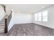 Spacious living room with luxury vinyl plank flooring, recessed lighting, and multiple large windows at 6801 Seabiscuit Rd, Whitestown, IN 46075