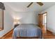 Inviting bedroom features a window and hardwood floors, creating a cozy retreat at 7104 Combs Rd, Indianapolis, IN 46237
