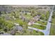 Residential neighborhood showcasing well-manicured lawns, mature trees, and a variety of home styles at 7114 Hickory Rd, Indianapolis, IN 46259
