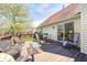 Spacious outdoor deck featuring dining and seating areas, perfect for relaxing and entertaining at 7114 Hickory Rd, Indianapolis, IN 46259