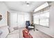 Bright and airy living room with a ceiling fan, slider door, and neutral décor at 7114 Hickory Rd, Indianapolis, IN 46259