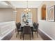 Dining room showcases a long table with seating for eight, and natural light at 720 Bucksport Ln, Westfield, IN 46074
