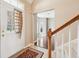 Welcoming foyer with tiled floor, staircase, and view into the living area at 720 Bucksport Ln, Westfield, IN 46074