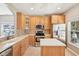 Kitchen featuring stainless steel appliances, light wood cabinetry and an island at 720 Bucksport Ln, Westfield, IN 46074