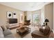 Bright living room featuring hardwood floors, neutral walls, modern furniture, and natural light at 720 Bucksport Ln, Westfield, IN 46074