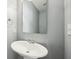 Modern powder room features a pedestal sink, brushed metal faucet, and sleek fixtures at 720 Bucksport Ln, Westfield, IN 46074