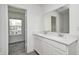 This bathroom has a double sink vanity and a view of the exterior at 7265 Governors Row, Avon, IN 46123