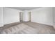 This large bedroom features neutral carpet and several doorways leading to other rooms at 7265 Governors Row, Avon, IN 46123