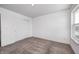 This charming bedroom is complete with a closet with sliding doors and neutral carpet at 7265 Governors Row, Avon, IN 46123