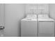 Modern, well-lit laundry room featuring new-model washer and dryer hookups at 7265 Governors Row, Avon, IN 46123