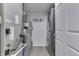 Efficient laundry room features washer, dryer, and utility equipment in a compact space at 7860 Sergi Canyon Dr, Indianapolis, IN 46217