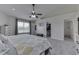 Relaxing bedroom features carpet, ceiling fan, natural light and closet at 7860 Sergi Canyon Dr, Indianapolis, IN 46217