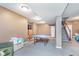 Spacious basement featuring a ping pong table and ample room for activities and entertainment at 8181 Fairway Dr, Brownsburg, IN 46112
