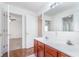 Well-lit bathroom featuring a double sink vanity and neutral-toned walls at 8181 Fairway Dr, Brownsburg, IN 46112