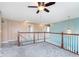 Bright loft area with natural light and views, offering a flexible space for relaxation or entertainment at 8181 Fairway Dr, Brownsburg, IN 46112