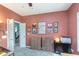 Cozy office space with unique decor, neutral carpet, and natural light, perfect for a home workspace at 8181 Fairway Dr, Brownsburg, IN 46112