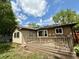 Expansive back deck featuring wood railing, ideal for relaxation and outdoor enjoyment at 8218 San Carlos Ct, Indianapolis, IN 46256