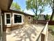 Spacious back deck perfect for entertaining, complemented by a brick exterior and natural light at 8218 San Carlos Ct, Indianapolis, IN 46256