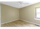 This is a bedroom with neutral paint and hardwood flooring at 8218 San Carlos Ct, Indianapolis, IN 46256