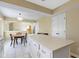 Kitchen featuring a large island with ample storage and a view into the adjacent dining area at 8218 San Carlos Ct, Indianapolis, IN 46256