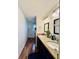 Bathroom features double sinks with granite countertop and modern lighting fixtures at 8231 Trevellian Way, Indianapolis, IN 46217