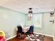 Inviting dining area with table set for four and ample natural light at 8231 Trevellian Way, Indianapolis, IN 46217