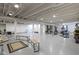 Spacious basement featuring gym equipment and ample open space for versatile use at 8324 Thorn Bend Dr, Indianapolis, IN 46278