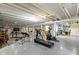 Finished basement with gym equipment, open layout and plenty of space for activities at 8324 Thorn Bend Dr, Indianapolis, IN 46278