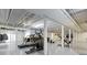 Finished basement featuring gym equipment and lighting, perfect for fitness activities at 8324 Thorn Bend Dr, Indianapolis, IN 46278