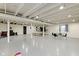 Finished basement with painted concrete floors, recessed lighting, and a seating area at 8324 Thorn Bend Dr, Indianapolis, IN 46278