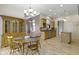 Cozy dining area connected to the kitchen with hardwood floors and a large hutch at 8324 Thorn Bend Dr, Indianapolis, IN 46278