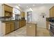Spacious kitchen with granite countertops, stainless steel appliances, and wood cabinetry at 8324 Thorn Bend Dr, Indianapolis, IN 46278