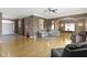 Open living area with hardwood floors, multiple seating areas, and an airy open floor plan at 8324 Thorn Bend Dr, Indianapolis, IN 46278