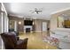 Bright living room features a fireplace, hardwood floors, ample seating and seamless open floorplan at 8324 Thorn Bend Dr, Indianapolis, IN 46278