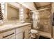 Updated bathroom with a granite vanity, framed mirror, and glass shower at 8330 Dumfries Dr, Brownsburg, IN 46112