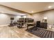 Well-lit office with desk, storage, multiple monitors and workout equipment, blending work and fitness at 8330 Dumfries Dr, Brownsburg, IN 46112