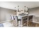 Basement wet bar with pendant lighting, granite counters and seating at 8330 Dumfries Dr, Brownsburg, IN 46112