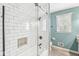 Elegant bathroom showcasing a tiled shower, modern fixtures, and a serene ambiance with natural light at 8639 Lancaster Rd, Indianapolis, IN 46260