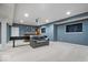 Basement with shuffleboard, bar area, and seating, perfect for entertainment at 957 Commander Ct, Westfield, IN 46074