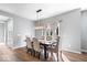 Dining room features modern chandelier and hardwood flooring at 957 Commander Ct, Westfield, IN 46074