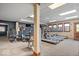 Community gym equipped with modern treadmills, exercise bikes, and weight machines for a complete workout at 957 Commander Ct, Westfield, IN 46074