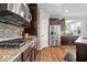 Kitchen features stainless appliances, granite countertops, and a gas range stove at 957 Commander Ct, Westfield, IN 46074