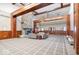 Spacious lobby area with a grand stone fireplace and comfortable seating for gatherings and relaxation at 957 Commander Ct, Westfield, IN 46074