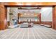 Inviting lobby area with a striking stone fireplace, ample seating, and elegant architectural details at 957 Commander Ct, Westfield, IN 46074