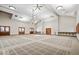 Large, versatile meeting space with high ceilings, recessed lighting, and stylish carpet ready for anything at 957 Commander Ct, Westfield, IN 46074