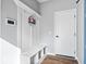 Hallway features coat rack and bench with storage at 957 Commander Ct, Westfield, IN 46074