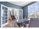 Home office with french doors leading to staircase and hardwood floors at 957 Commander Ct, Westfield, IN 46074