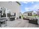 Outdoor living featuring a built-in grill, outdoor seating, and entertainment area at 957 Commander Ct, Westfield, IN 46074