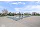 Community pool area covered for the off-season with neighborhood homes in the background on a sunny day at 957 Commander Ct, Westfield, IN 46074