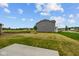 Large, newly-sodded backyard provides ample space for outdoor activities at 10138 Redwood Peak Ln, Indianapolis, IN 46259